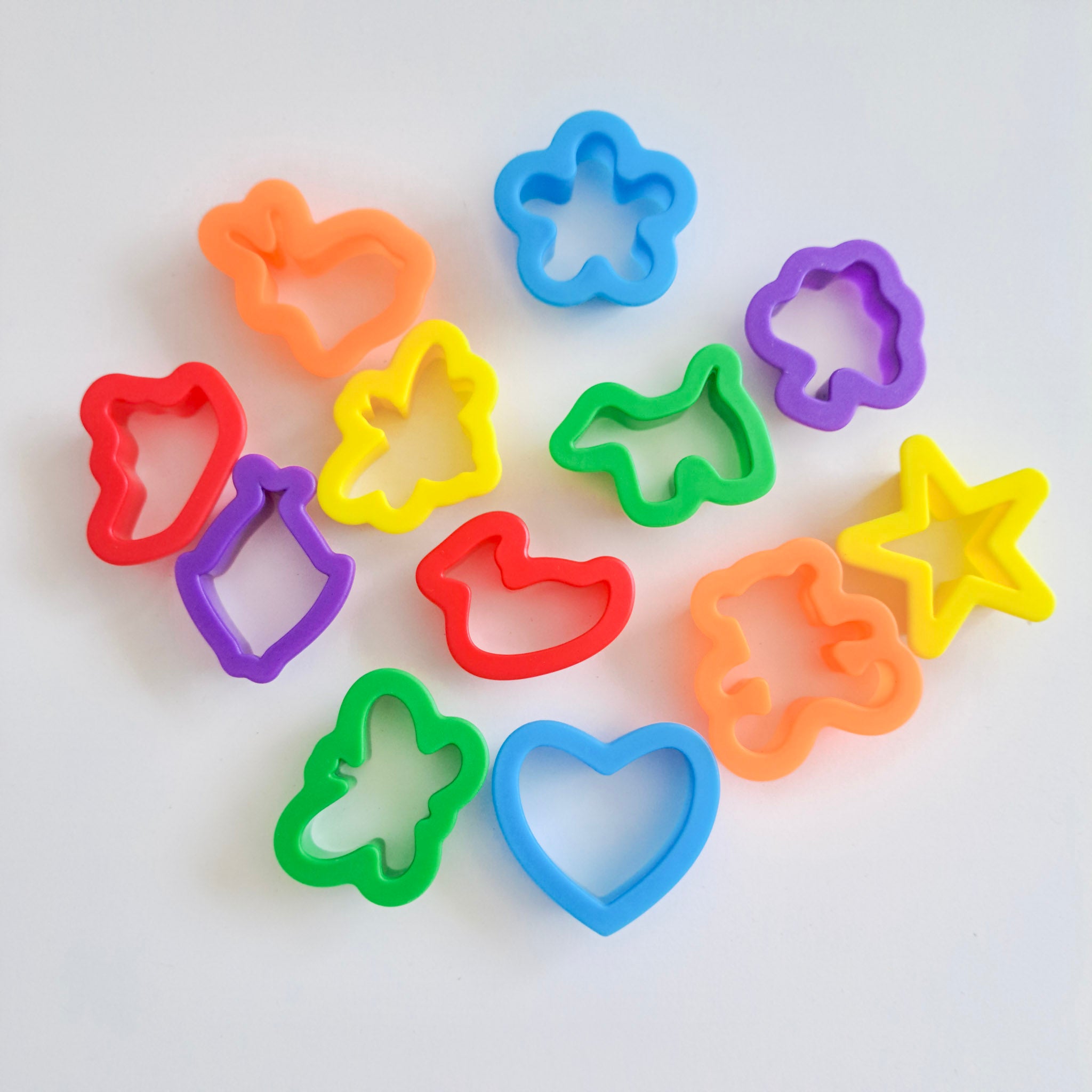 Mini playdough cutters in assorted colors and shapes