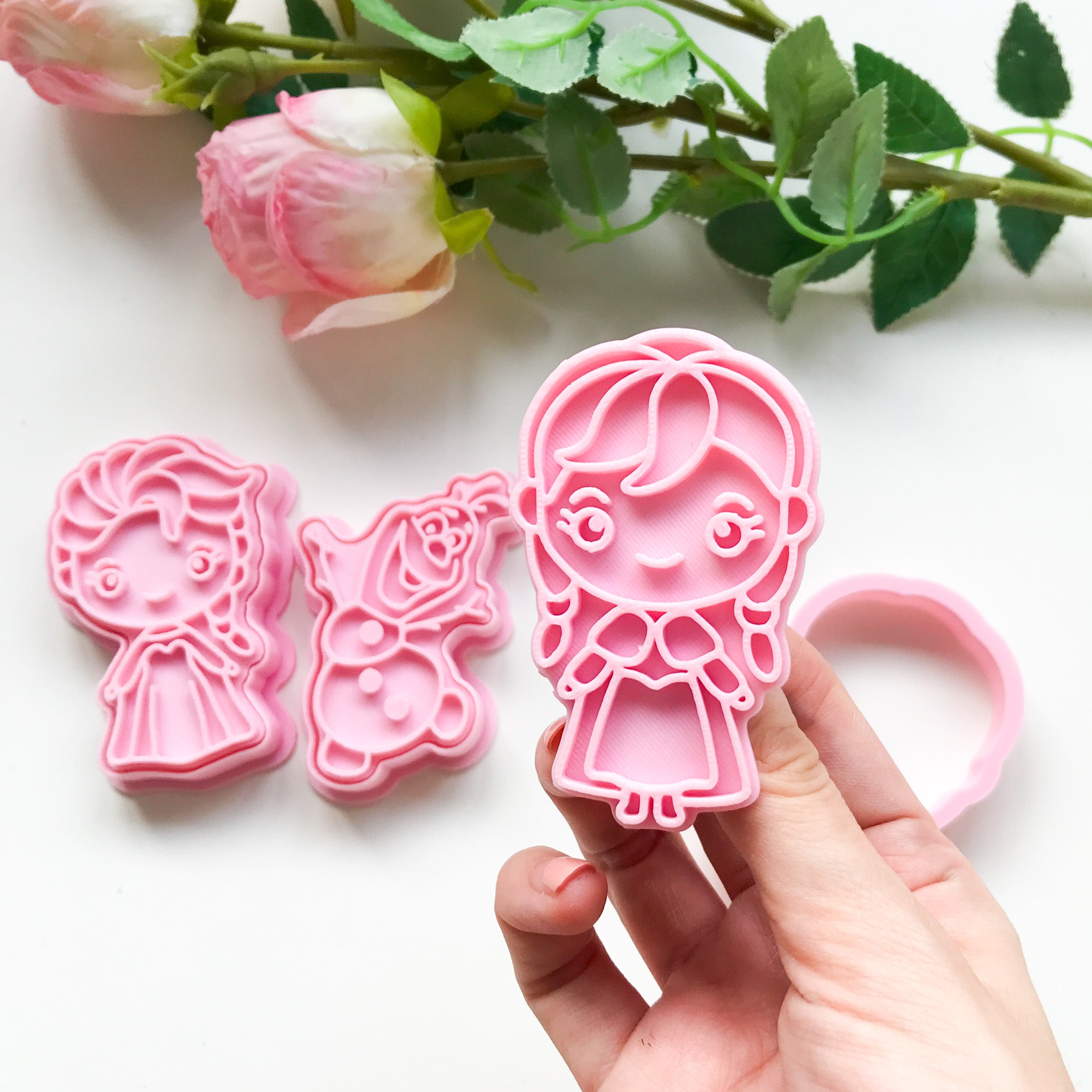 A set of 3 frozen themed playdough cutters. Elsa, Olaf and Anna.