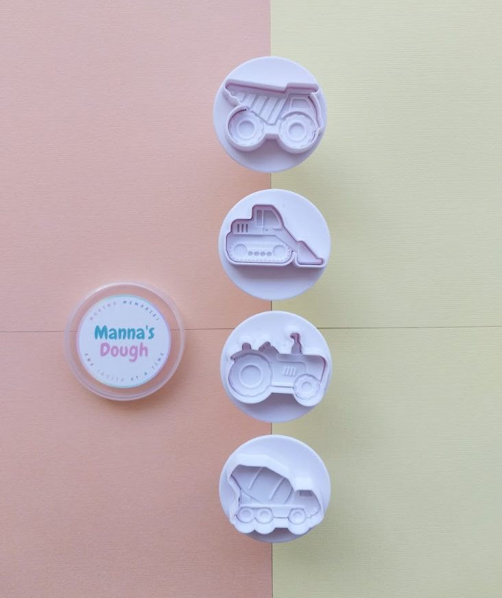 A st of 4 construction themed playdough cutters