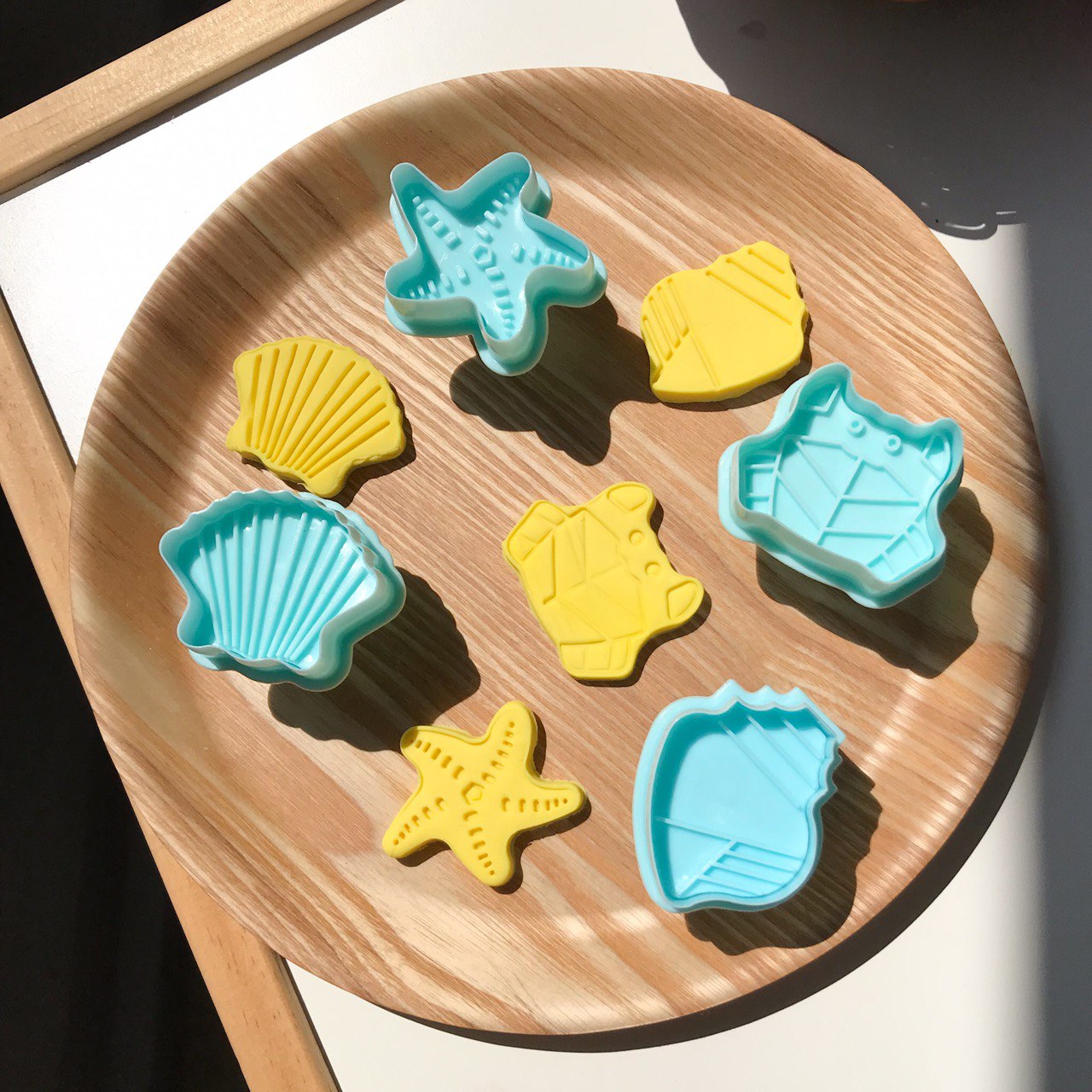 a set of 4 playdough cutters and their respective imprints